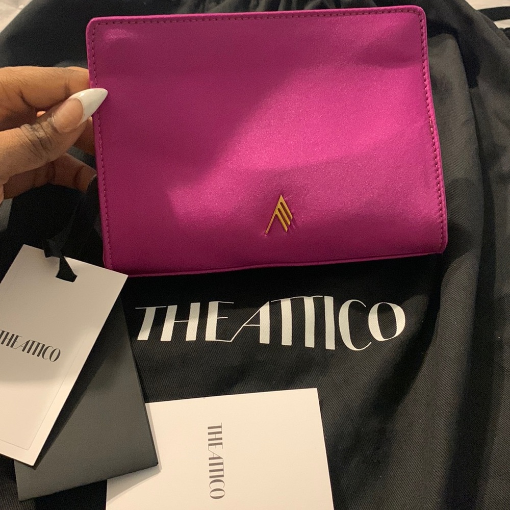 The Attico pink clutch